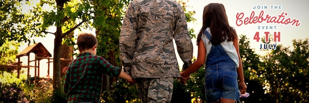 Two soldiers embracing in front of a military transport plane, with other uniformed personnel visible in the background, signifying reunion and the enduring nature of military friendships.