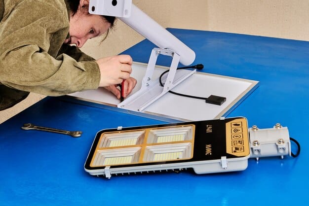A naval engineer examining a 3D-printed metal component, possibly a specialized valve or bracket, on board a US Navy vessel or naval base, showing the practical application of the technology.
