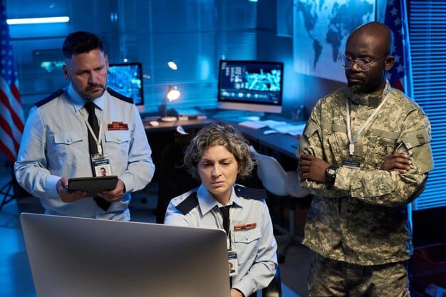 A diverse group of cybersecurity experts, military personnel, and government officials in a command center, intensely collaborating around digital screens displaying complex network graphs and threat metrics, symbolizing a unified response to a cyber crisis.