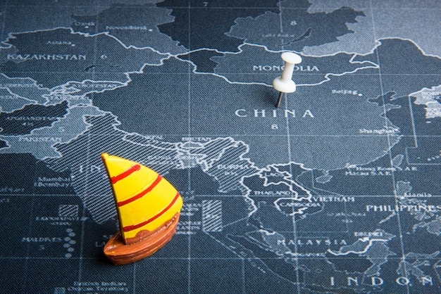A map of the South China Sea highlighting key areas of territorial dispute, US naval bases in the region, and major shipping lanes. The map should visually represent the strategic importance of the South China Sea and the geopolitical complexities involved in the US Military's Strategy for Countering China's Military Expansion in the South China Sea.