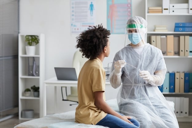 A doctor wearing personal protective equipment (PPE) examines a patient in a medical tent during a pandemic simulation exercise. The doctor is surrounded by medical equipment and other healthcare workers, highlighting the readiness and professionalism of the medical team in a crisis.