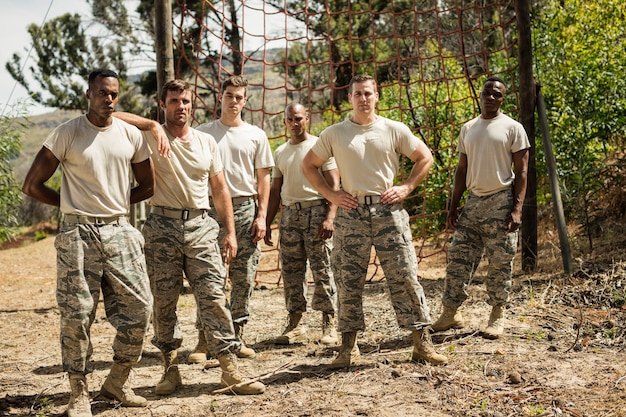 A group of US Marines participating in a joint military exercise with an allied nation, showcasing the importance of strategic partnerships in enhancing US power projection capabilities and asking How Will the US Military's Modernization Efforts Affect its Global Power Projection in the Next 2 Years?. The image should be in a desert area.